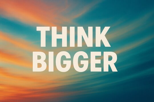 "Think Bigger" Text Against a Sky
