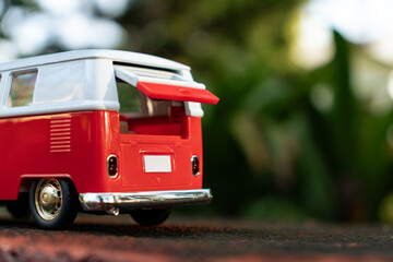 A toy car in the park. After edits.