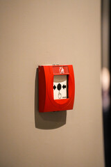 fire alarm switch on wall