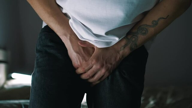 Prostate problems in a young man of European appearance.
A guy has a sexually transmitted disease.
Infection of the genital organs and weak potency