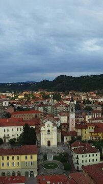 Vertical Format Video of Aerial view of the Lago Maggiore and the Borromean Islands. Arona, Italy Beautiful city surrounded by mountains and Lake Maggiore