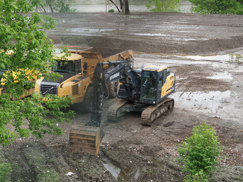 Hyundai escavator and Volvo articulated dumper