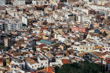 Aerial view of dense Spanish city with tightly packed buildings