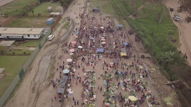 Aerial drone shot of huge market in a village in Papua New Guinea. High quality 4k footage