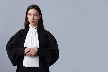 Judge on gray background, space for text