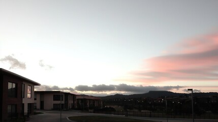 Obraz premium Sunset over suburban housing estate.