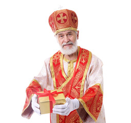 Fototapeta premium Saint Nicholas with gift on white background