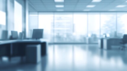 Blurred interior view of a modern office space.