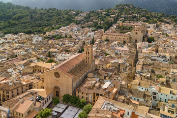 Naklejka premium Aerial view of the picturesque town of Pollensa in Mallorca, Spain.