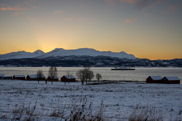 Landscape with boat during sunrise, Harstad, Norway