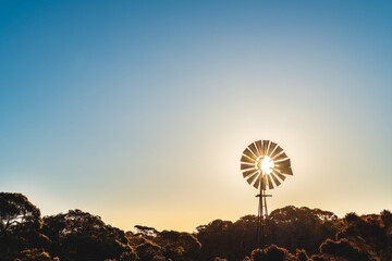 Old windmill with sun shining through on a hot day near Marion Bay, Yorke Peninsula, South Australia