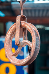 old rusty metal pulley wheel