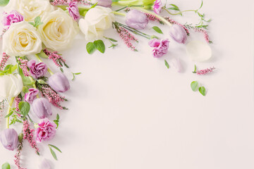 frame of beautiful flowers on white background