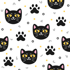 Cute black cat hand drawn, seamless vector design for print on fabric and other uses.