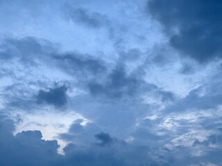 blue afternoon sky with black cloudy clouds about to rain, natural sky background