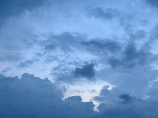 blue afternoon sky with black cloudy clouds about to rain, natural sky background