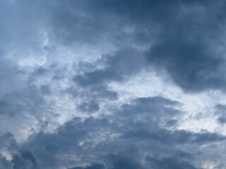 blue afternoon sky with black cloudy clouds about to rain, natural sky background