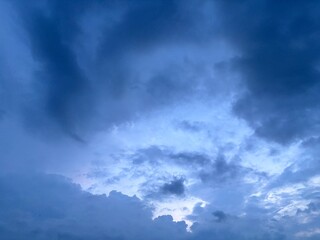 blue afternoon sky with black cloudy clouds about to rain, natural sky background