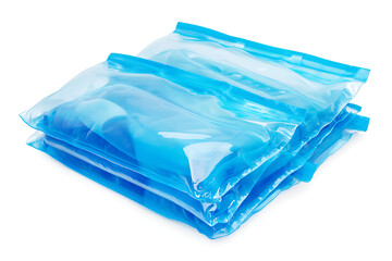 Fototapeta premium Stack of translucent blue vacuum-sealed bags containing various items on a clean white background