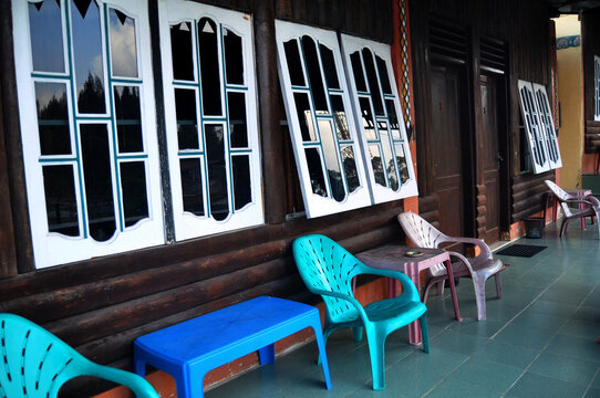 Terrace of classic vintage retro wooden building resort for Indonesian people living and foreign guest travelers travel visit rest relax in Kabupaten Karo at Sumatera Utara or North Sumatra, Indonesia