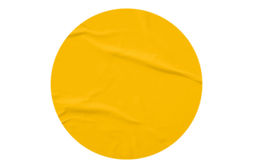yellow circle sticker with crumpled edges. Wrinkled round paper isolated on transparent background.