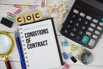 COC - Conditions of Contract acronym on notepad, Business and Financial concept background