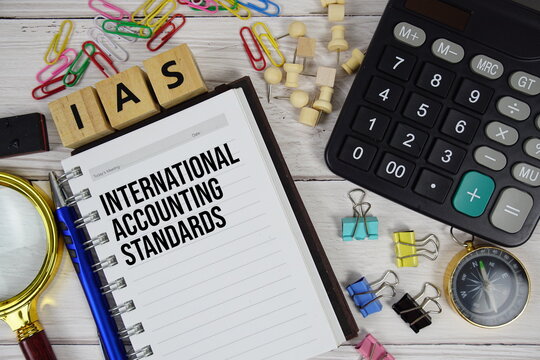 IAS - International Accounting Standards acronym on notepad, Business and Financial concept