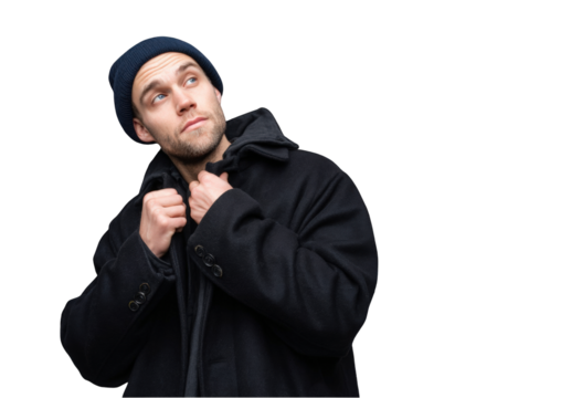 Man in coat and beanie looking up isolated on a transparent background