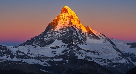 Obraz premium Mountain Peak Glowing at Sunset