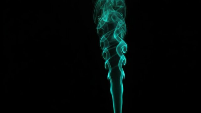 Blue thick smoke clouds billowing in a dense formation against a black background. Ideal for mysterious, atmospheric, and abstract themes.