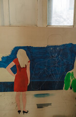 Eclectic artist studio in Tbilisi old town. Art-filled interior with canvases, brushes, handmade...