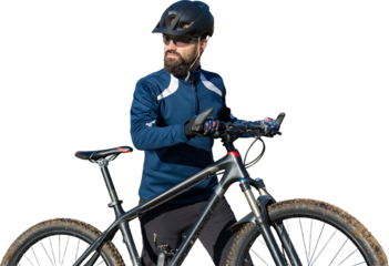 Cyclist in pants and fleece jacket on a modern carbon hardtail bike with an air suspension fork rides off-road.
