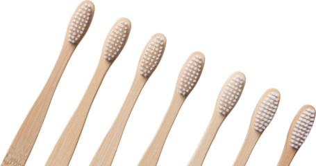 Set of ECO friendly wooden bamboo toothbrushes. Save the planet or NO plastic concept. Isolated on white background.