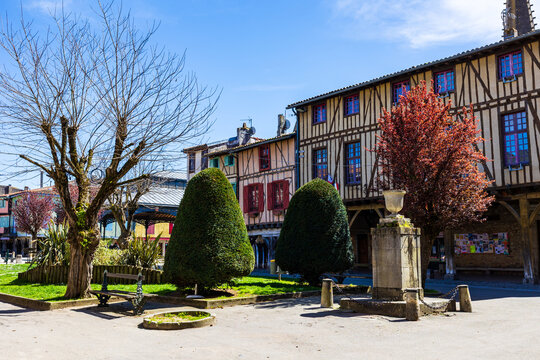 Half-timbered facades around the Place des Couverts in the old bastide of Mirepoix