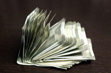 Indian Rupees 500 currency notes on the wooden table