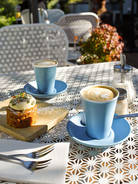Coffees and cake at a cafe