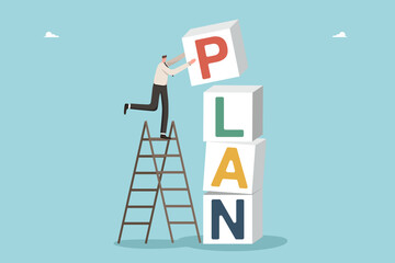 Planning a course of business development or career growth, leadership and initiative in achieving business goals, motivation and determination to succeed, man puts together the word plan from cubes.