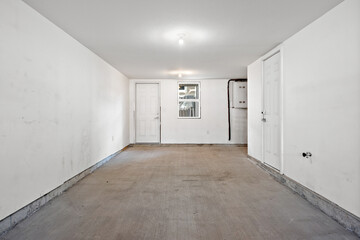 White room with a door and a window