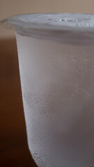 Chilled Mineral Water with Ice in Plastic Cup