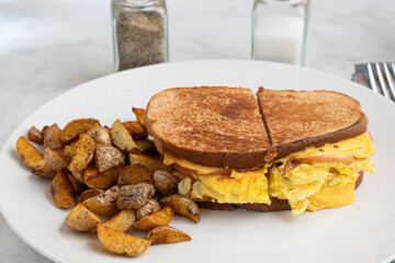  breakfast sandwich with  home fries
