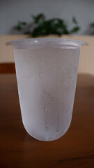 Chilled Mineral Water with Ice in Plastic Cup