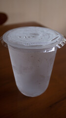 Chilled Mineral Water with Ice in Plastic Cup