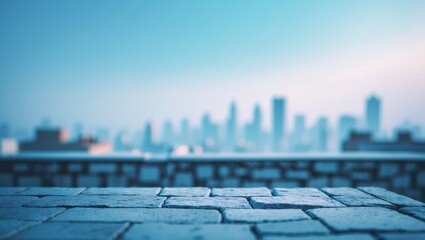 Stone terrace overlooking a hazy blue sky and urban skyline