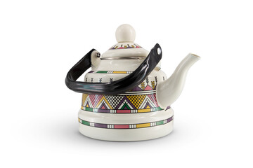 Vintage metal old kettle with patterns isolated on white background