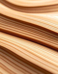 Curved layers of wood showcase intricate patterns and textures, highlighting the beauty of natural materials in design