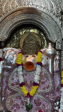 Idol of hindu god hanuman at temple to worship. Religious video concept.