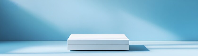 Obraz premium Empty white platform against a light blue background.