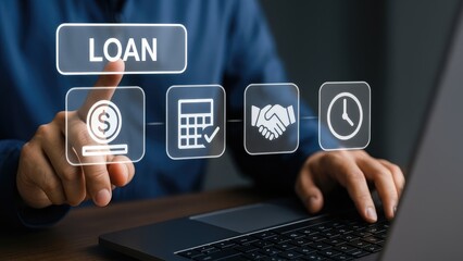 A person interacting with digital loan icons on a laptop, showcasing financial technology.