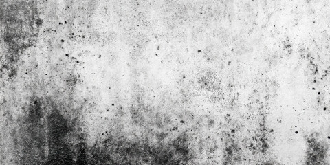 Fototapeta premium Detailed texture of weathered concrete wall showcasing various shades of gray and black