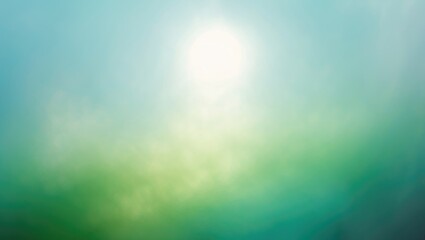 Soft-focused background showcasing green and blue sky tones